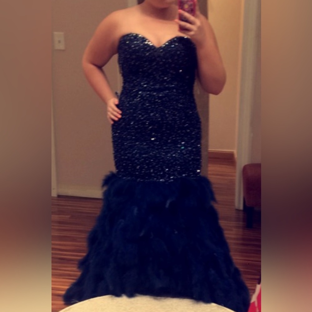Prom dress! Jovani size 12 navy hand beaded dress. Has a corset back
